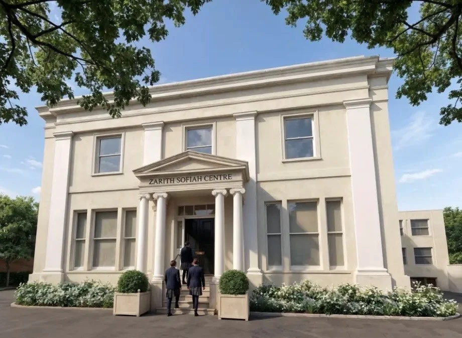 Architect's visualisation of a cream, three-storey Regency-style building with a columned porch and the words Zarith Sofiah Centre above the entrance, with pupils in uniform walking up the steps